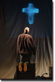 Christian (Neil Pugmire) reaches the Cross