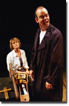 Ignorance (Roger Sutton) shows Hopeful (Debbie Sutton) the religious artefacts that he thinks will allow him to enter the Celestial City