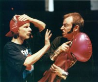 J-Team member Dudley (Neil Pugmire) is confronted by alien-wielding bad guy Crockford (Chris Richardson)